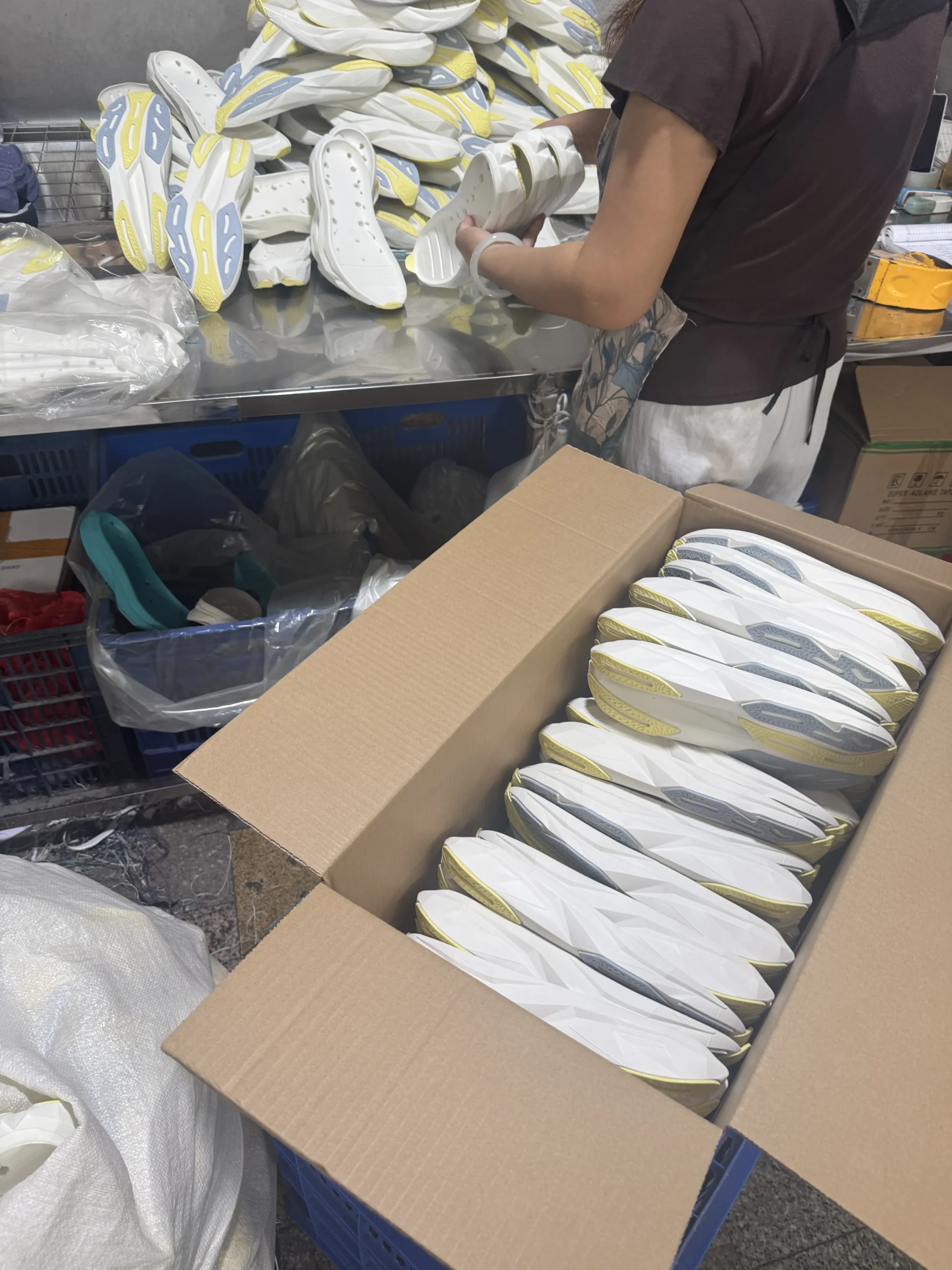 Quality inspection of finished multi-color sports shoe soles